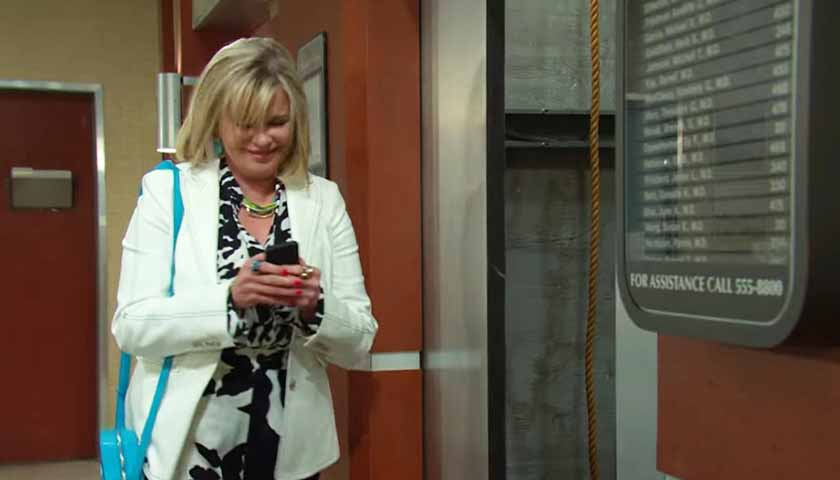 Days Of Our Lives: Bonnie looks down at her phone as she steps into an elevator shaft