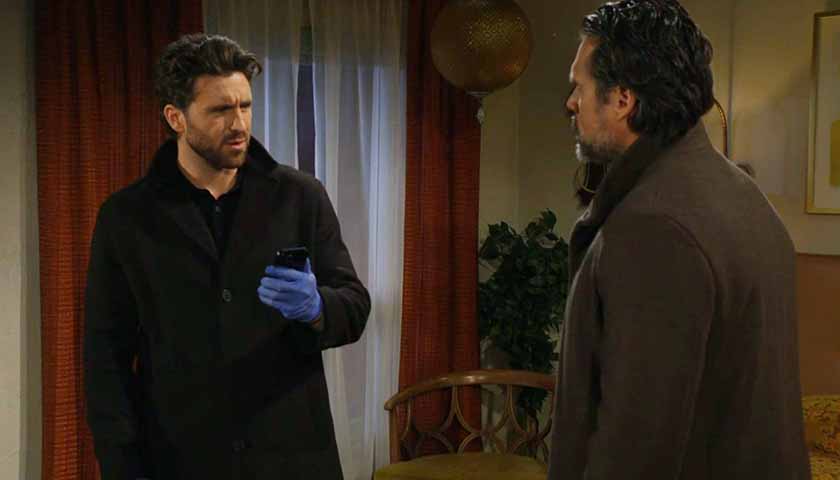 Y&R Scoop: Chance looks at Nick as he holds his phone