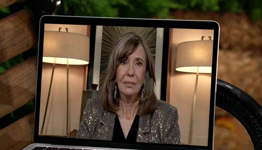 Y&R Scoop: Jill, on a laptop screen, gets surprising news from Sally