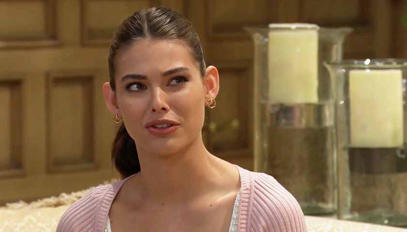 B&B Scoop: Electra, in pink sweater, sits on the couch at the Forrester estate