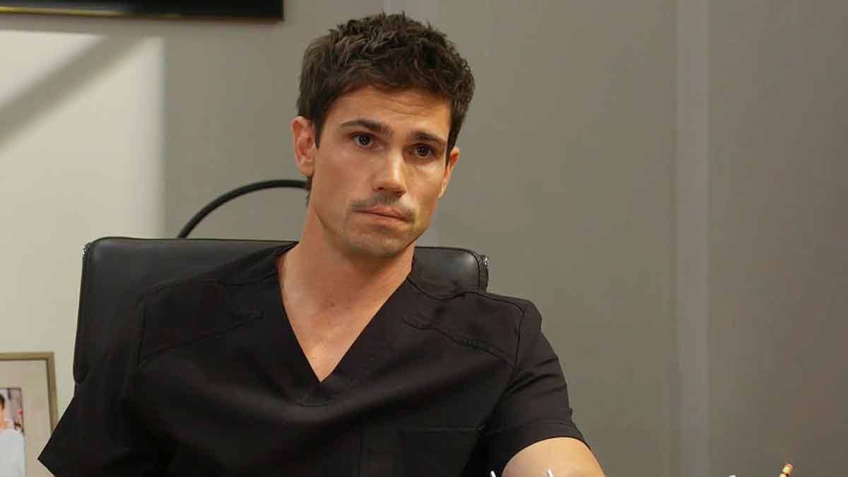 Finn talks to Li in his office on Bold and the Beautiful
